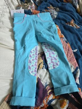 Belle & Bow Kids Turquoise Riding Pants with Purple Patterned Knee Patches